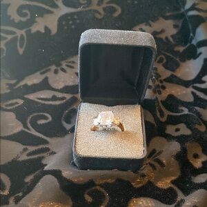 Goldtone ring with clear stones